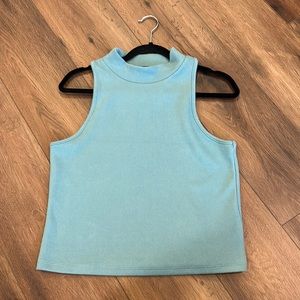 This is a aqua blue tank top with a high neck line.